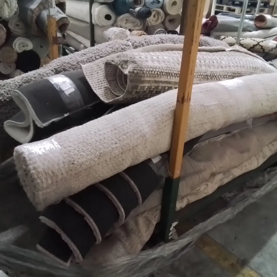 STILLAGE OF APPROXIMATELY13 QUALITY DESIGNER RUGS