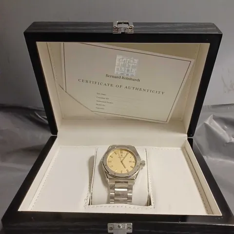 BOXED BERNARD REINHARDT SWISS MOVEMENT WATCH WITH MAGNOLIA COLOURED DIAL 