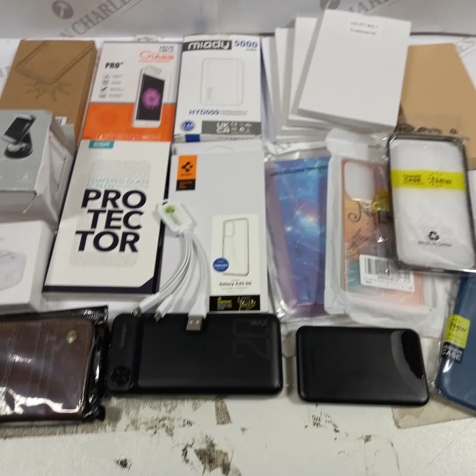 LOT OF ASSORTED MOBILE PHONE ACCESSORIES TO INCLUDE CASES, STANDS AND POWERBANKS