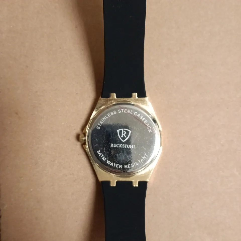 RUCKSTUHL GOLD-TONE WRISTWATCH WITH BLACK RUBBER STRAP