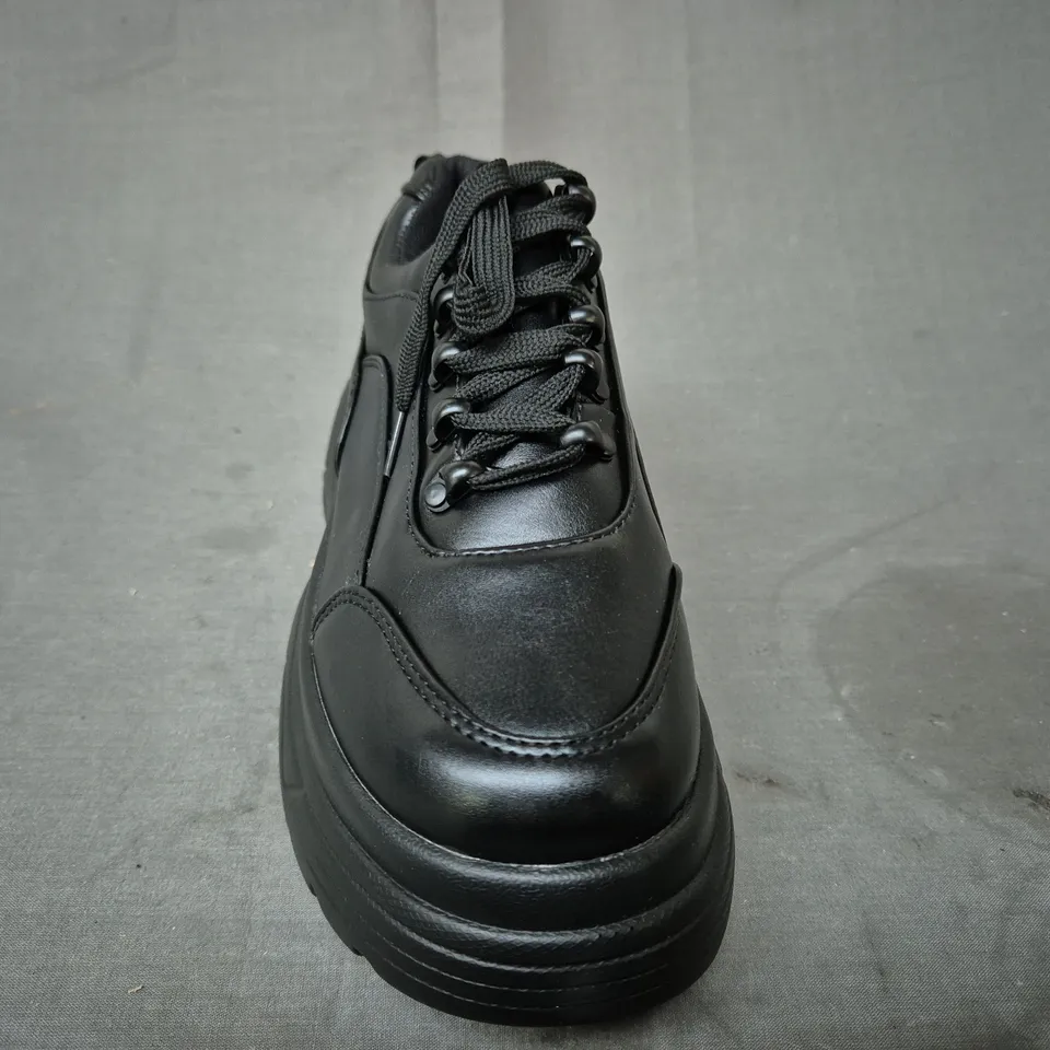 BOXED PAIR OF KOI STRIKER CHUNKY BUBBLE TRAINERS IN BLACK UK SIZE 5