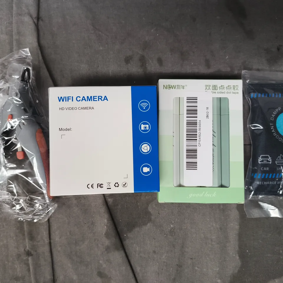 APPROXIMATELY 10 ASSORTED HOUSEHOLD ITEMS TO INCLUDE DOUBLE SIDED DOT TAPE, WI-FI CAMERA, ETC