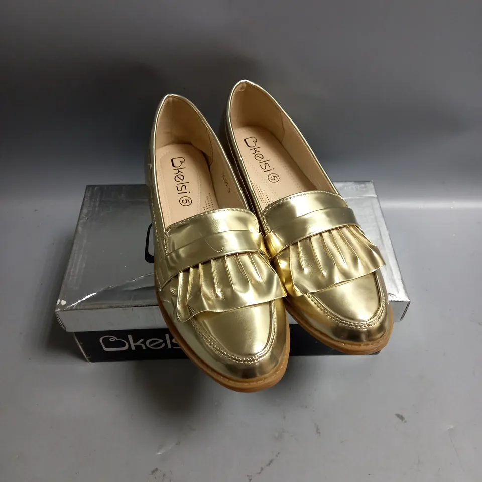 BOXED KELSI LADIES FLAT GOLD BROGUES. SIZE 5