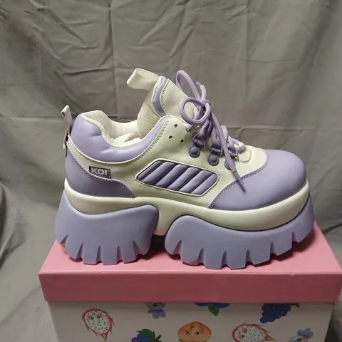 BOXED PAIR OF KOI FRUITTI TUTTI GRAPE JELLY TRAINERS IN PURPLE/WHITE SIZE UK 6