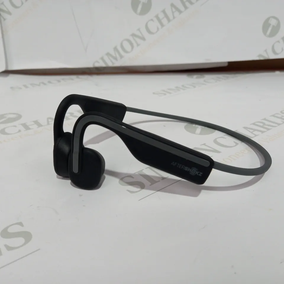 AFTERSHOKS WIRELESS BONE CONDUCTION HEADPHONES