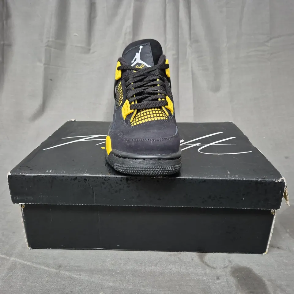 BOXED PAIR OF NIKE AIR JORDAN 4 RETRO SHOES IN BLACK/YELLOW UK SIZE 6