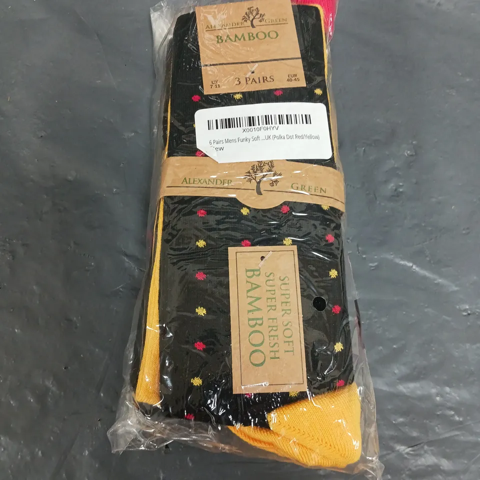 APPROXIMATELY 30 PAIRS OF FUNKY BAMBOO POLKA DOT SOCKS IN RED/YELLOW SIZE 7-11