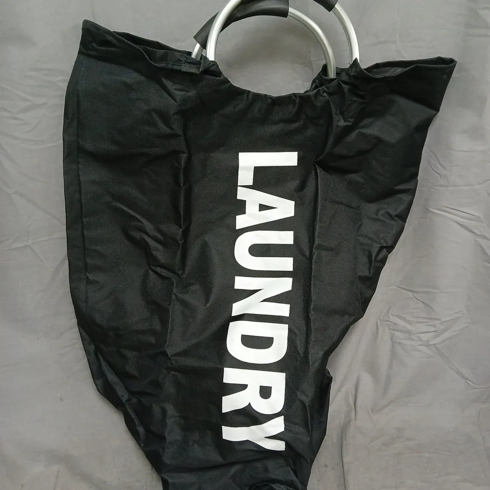 APPROXIMATELY 30 UNBRANDED LAUNDRY BAGS IN BLACK