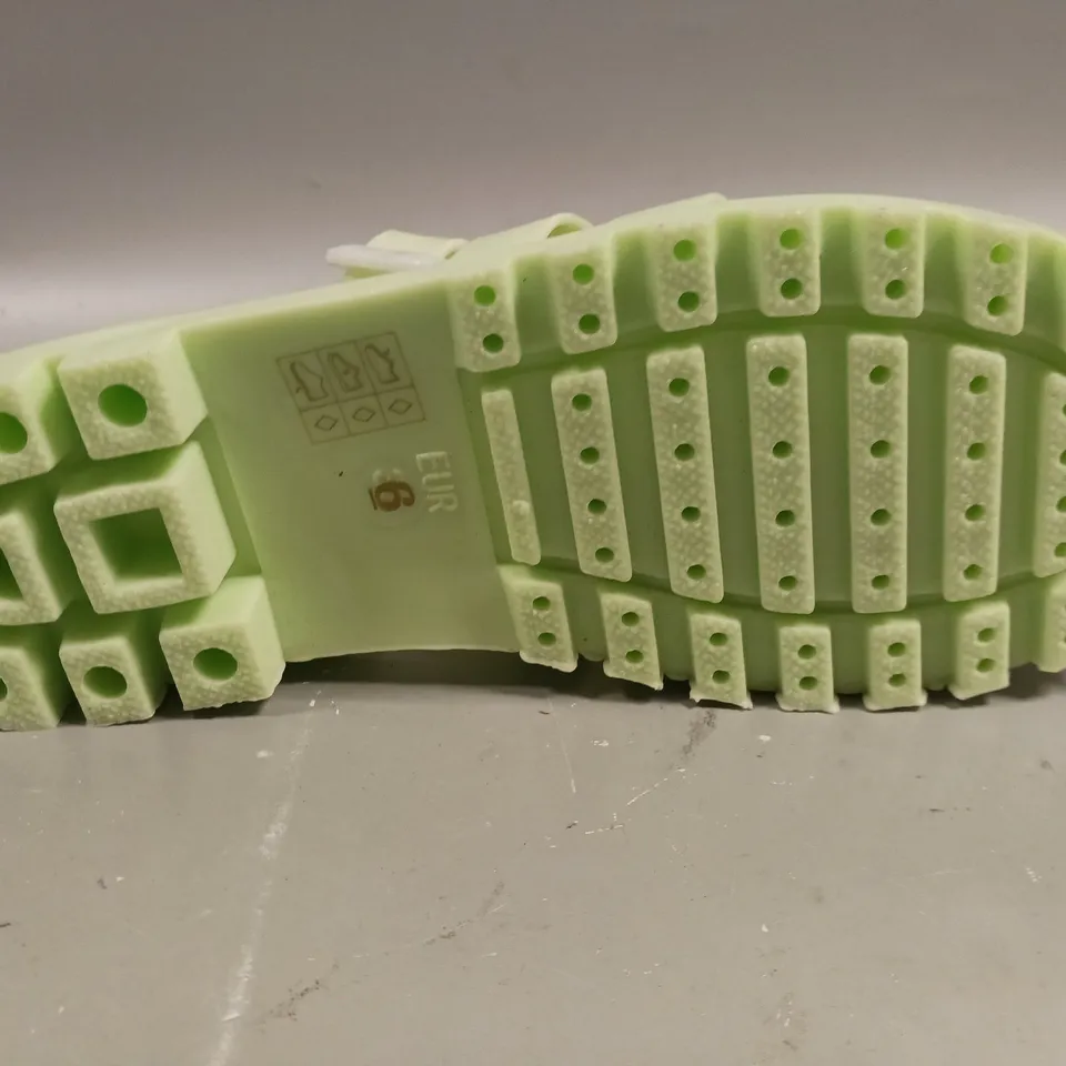 LOT OF APPROXIMATELY 12 PAIRS OF LINZI GREEN PLASTIC SANDALS - VARIOUS SIZES