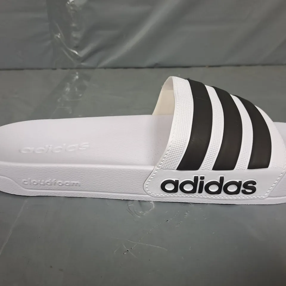 PAIR OF ADIDAS ADILETTE SHOWER SLIDES IN WHITE/BLACK - UK 10