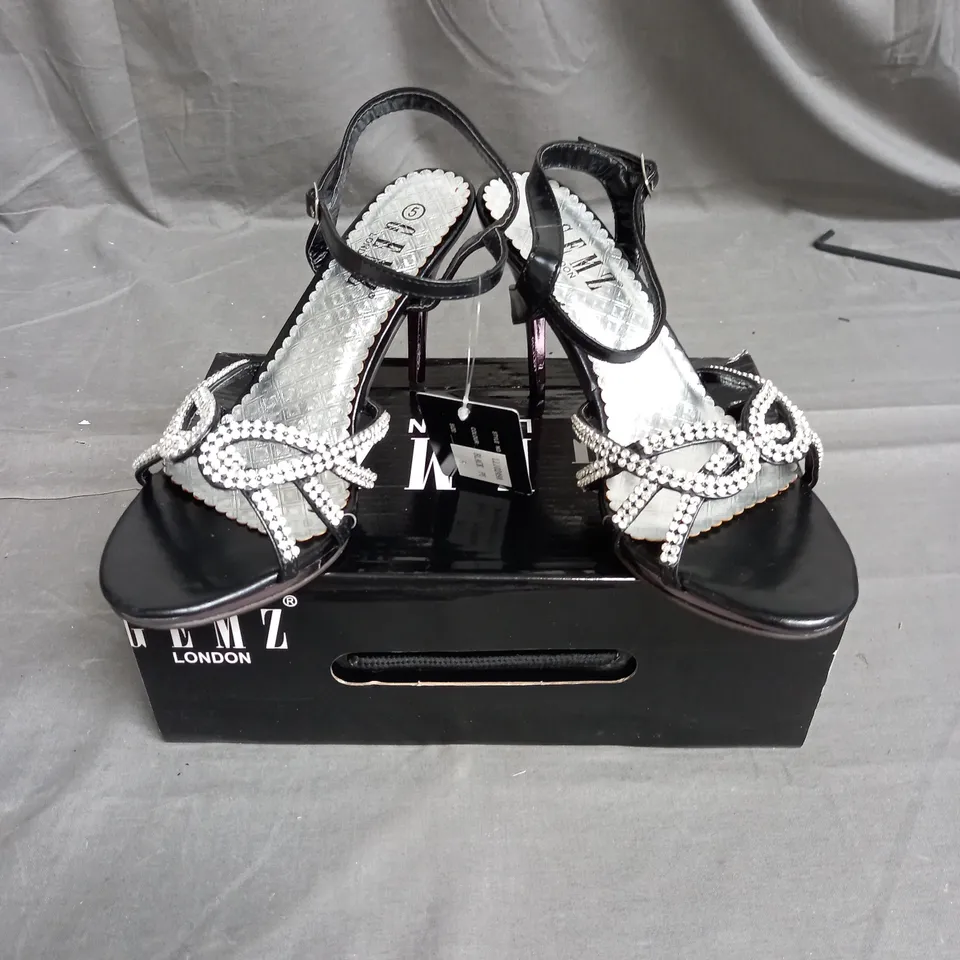 BOX OF APPROXIMATELY 12 PAIRS OF GEMS STRAP RHINESTONE HEELS IN BLACK - VARIOUS SIZES