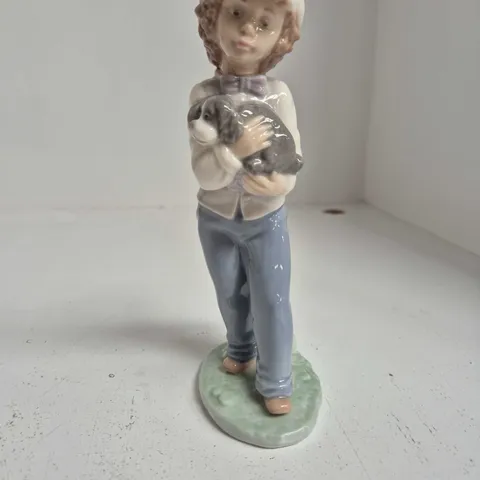 NAO LLADRΓ PORCELAIN FIGURINE β BOY HOLDING A DOG