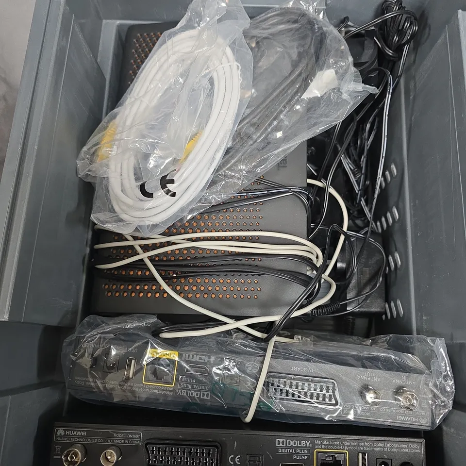 box of assorted cables and modems
