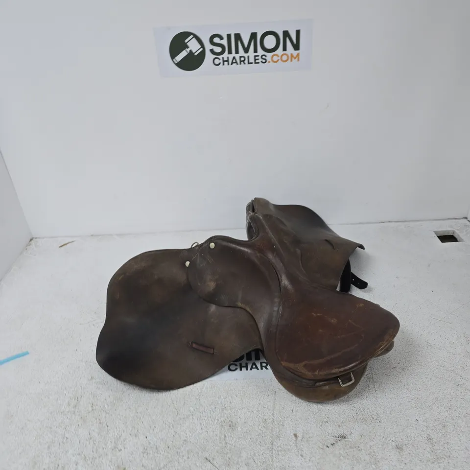BROWN LEATHER RIDING SADDLE WITH STIRRUPS