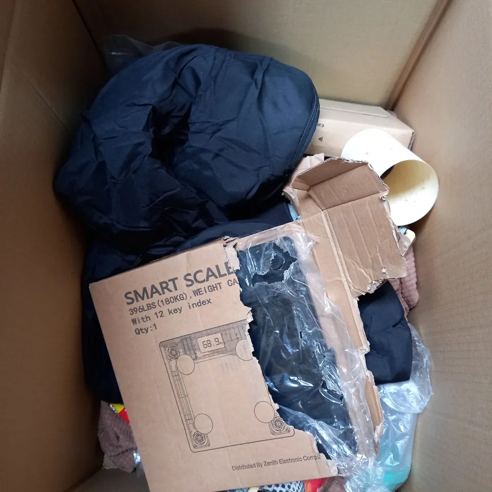 BOX OF APPROXIMATELY 10 ASSORTED ITEMS TO INCLUDE WI-FI SURGE PROTECTOR, CHUNKY YARN, SUIT BAGS ETC