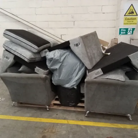 PALLET OF ASSORTED INCOMPLETE OR DAMAGED DESIGNER SOFAS AND SOFA PARTS