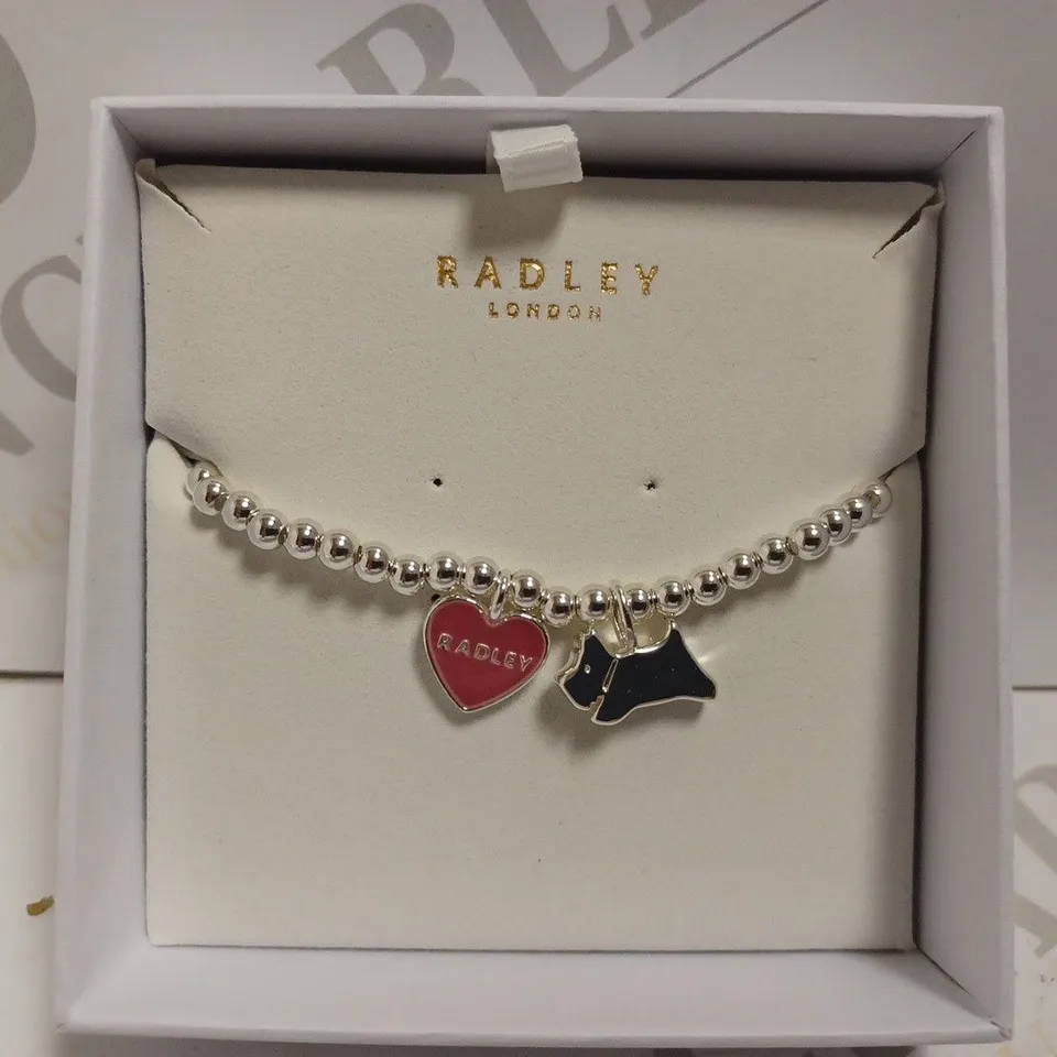 RADLEY LONDON SILVER EFFECT BRACELET WITH DOG AND HEART CHARM