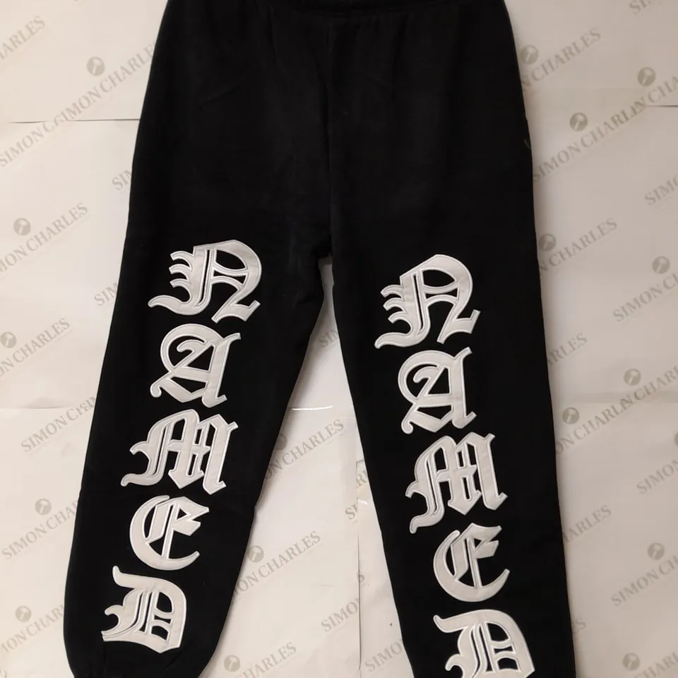 NAMED COLLECTIVE EMBROIDERED SWEATPANDS IN BLACK AND WHITE SIZE L