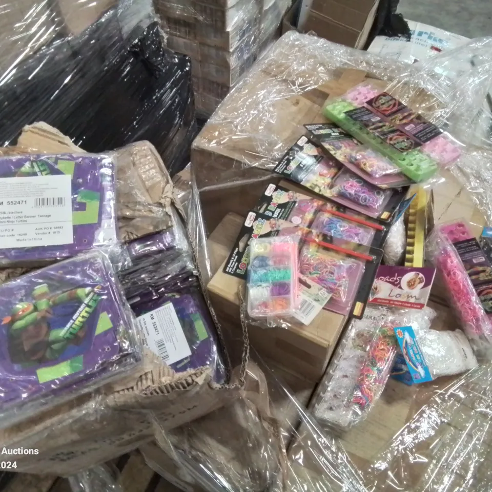 PALLET CONTAINING LOTS OF BRAND NEW PARTY DECORATIONS BANNERS, LOOM BANDS ETC.