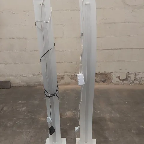 PAIR OF DESIGNER WAVE FLOOR LAMPS