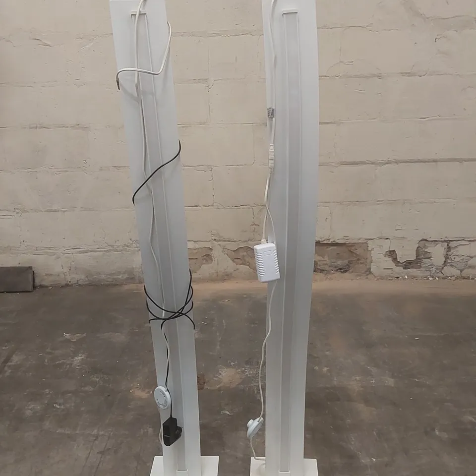 PAIR OF DESIGNER WAVE FLOOR LAMPS