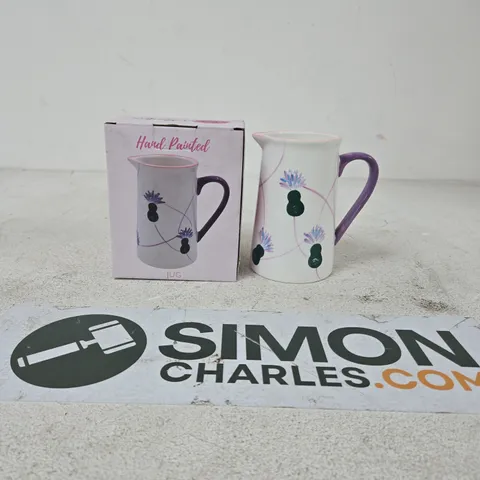 Hand Painted Ceramic Jug with Purple Handle β Floral Design