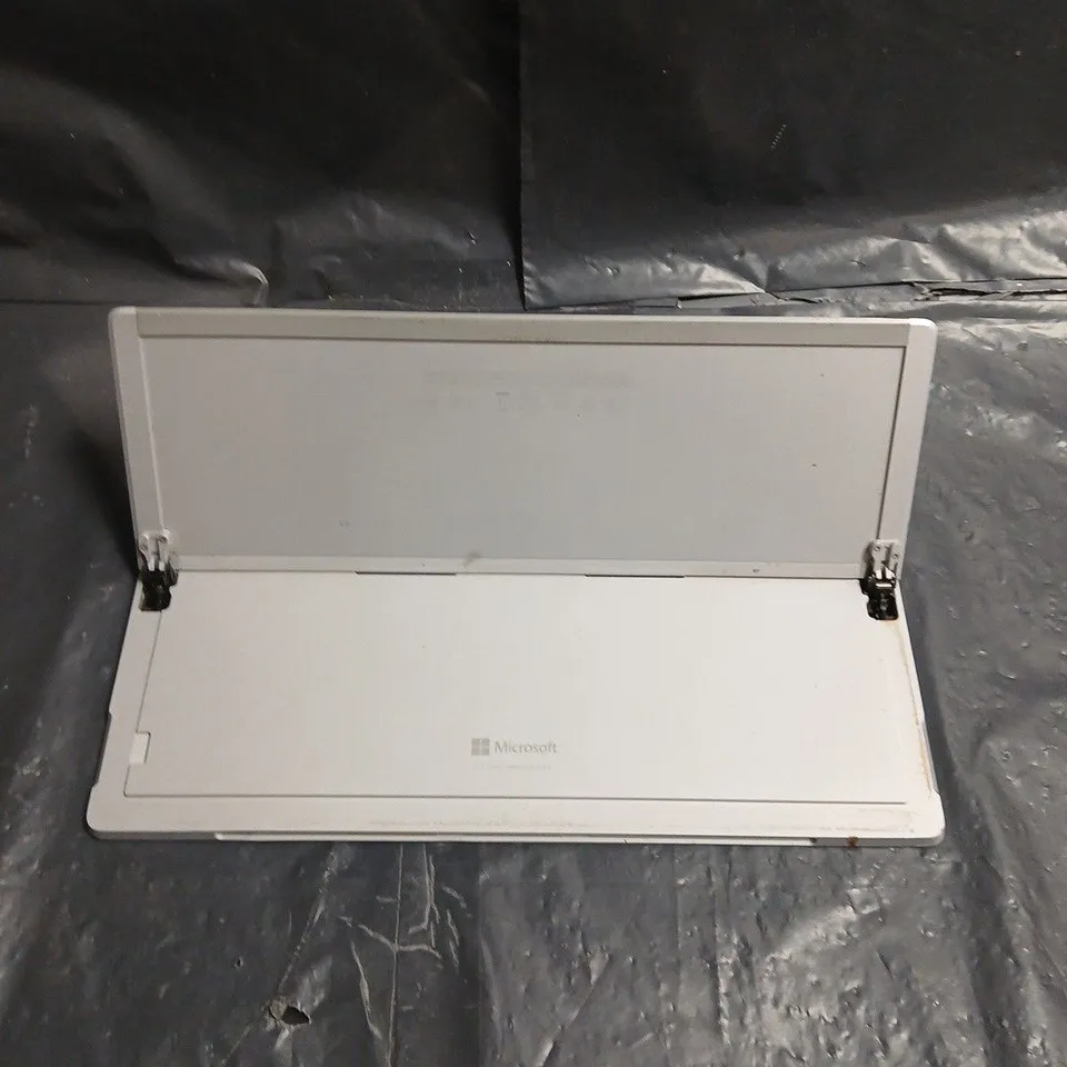 MICROSOFT TABLET – SILVER, WITH STAND