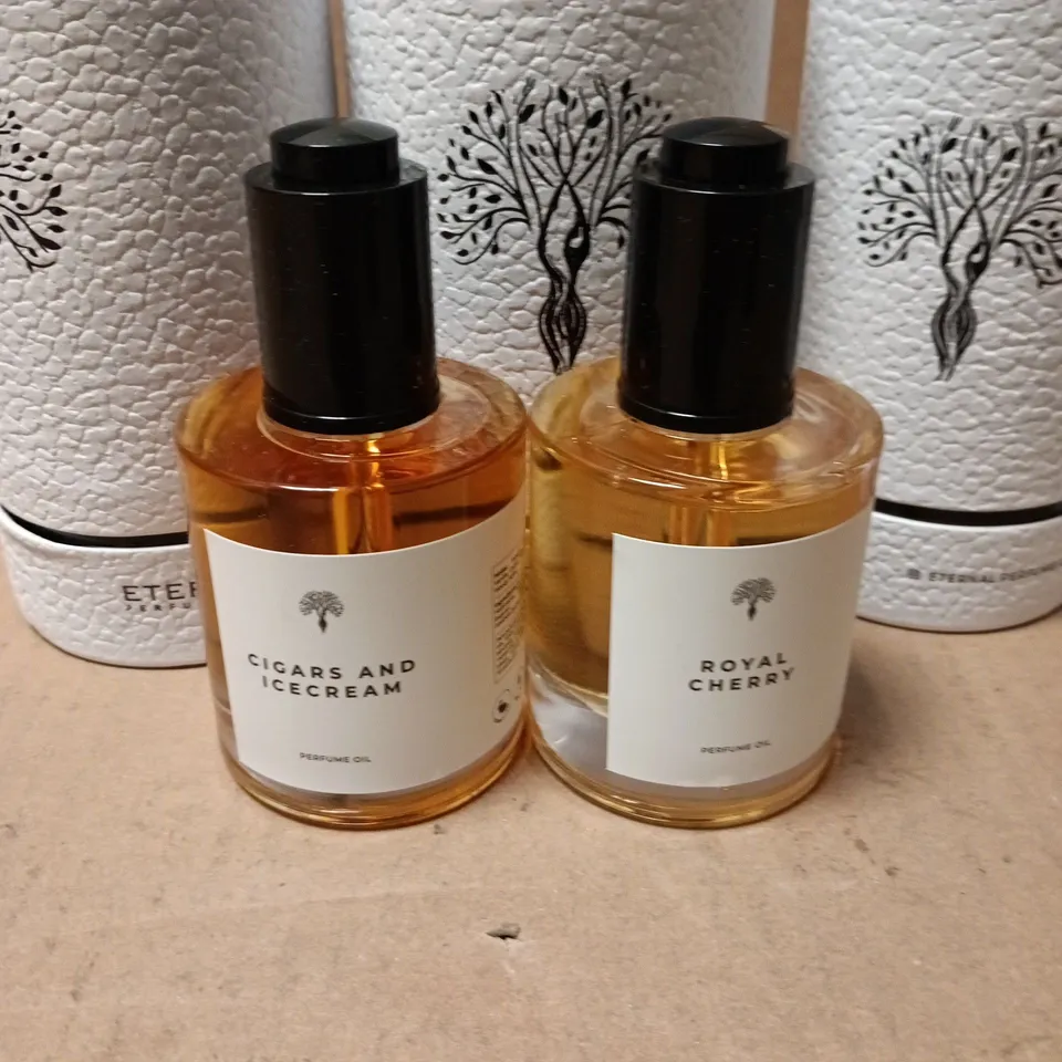 LOT OF 4 ASSORTED ETERNAL PERFUME OILS TO INCLUDE ROYAL CHERRY AND CIGARS & ICE CREAM - 2 SIZES