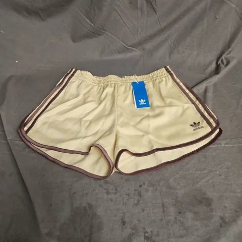 ADIDAS 3 STRIPE SPRINTER SHORTS IN POWDER YELLOW/BROWN SIZE M