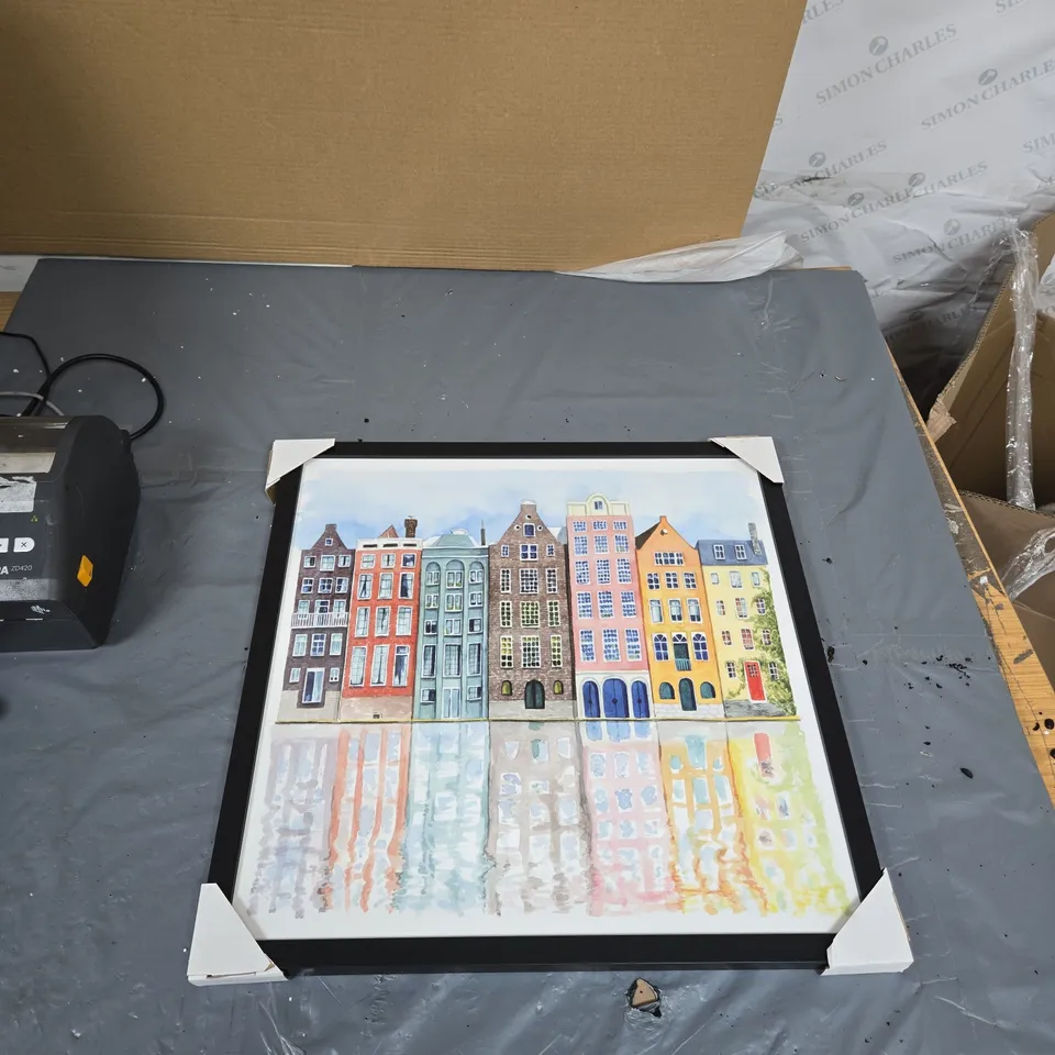 CITYSCAPE PRINT IN FRAME – ROW OF COLOURFUL TOWNHOUSES BY WATER