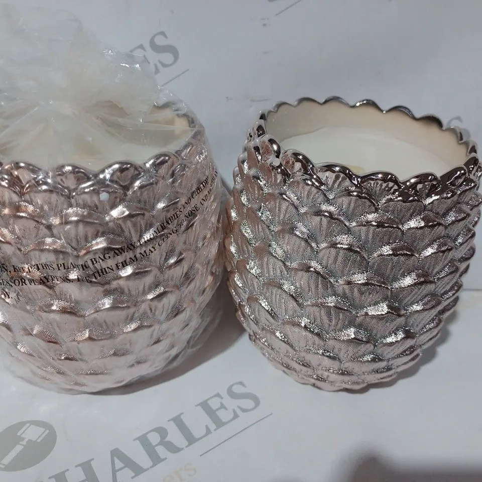 BOXED HOMEWORX BY HARRY SLATKIN PAIR OF AUTUMN PINECONE SCENTED CANDLES IN ROSE GOLD COLOUR