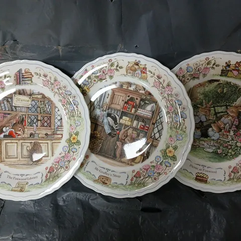 3 WEDGWOOD FOXWOOD TALES A FINE BONE CHINA 21CM PLATE BY BRAIN PATERSON TO INCLUDE PICNIC AT FOXWOOD, MR GRUFFEY'S SHOP, THE FOXWOOD LIBRARY