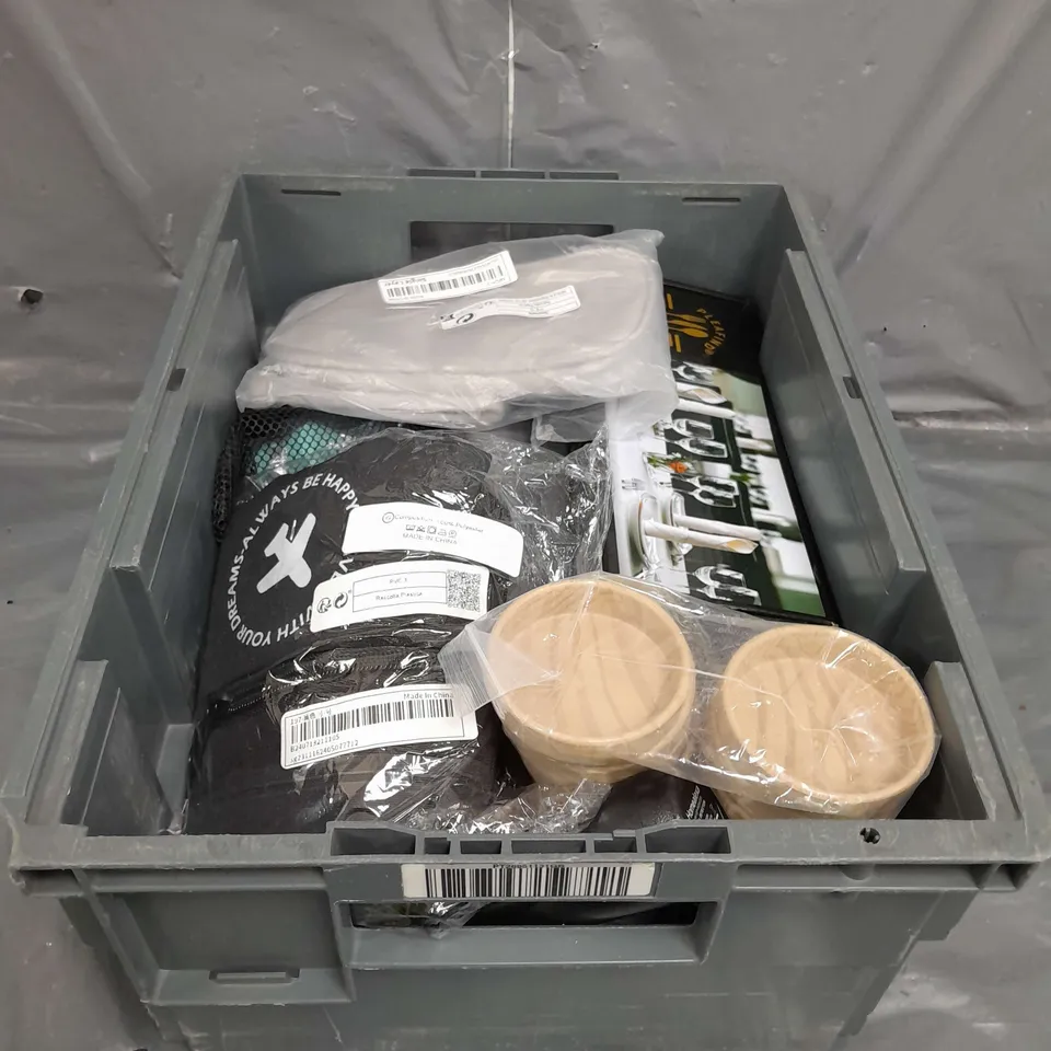 TOTE OF APPROX 10 HOUSEHOLD ITEMS TOO INCLUDE WASHBAGS , BOTTLES , CUTLERY  , ETC. 