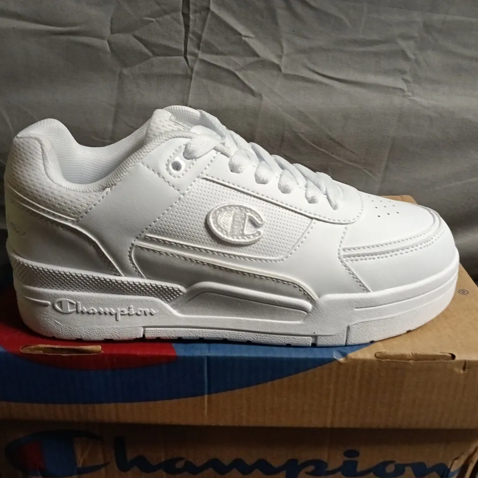 BOXED PAIR OF CHAMPION WHITE SNEAKERS -UK SIZE 6