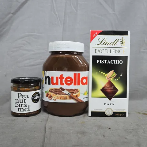 APPROXIMATELY 5 ASSORTED FOOD AND DRINK ITEMS TO INCLUDE NUTELLA, LINDT, ETC