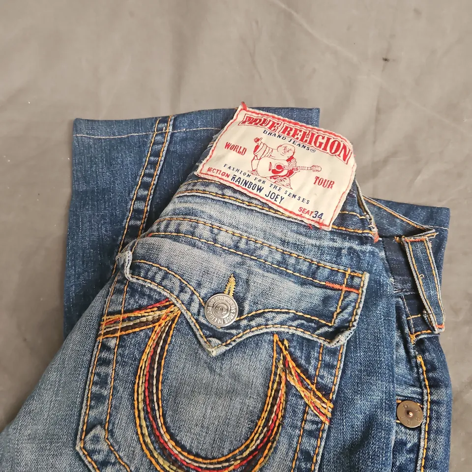 TRUE RELIGION DENIM JEANS WITH RAINBOW STITCHING, SIZE 28