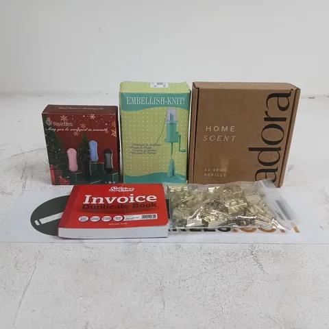 TOTE OF APPROXIMATELY 15 ASSORTED ITEMS TO INCLUDE ADORA HOME SCENT REFILLS, INVOICE DUPLICATE BOOK, HAND WARMERS, EMBELLISH KNIT, GOLD COLOURED CLIPS ETC