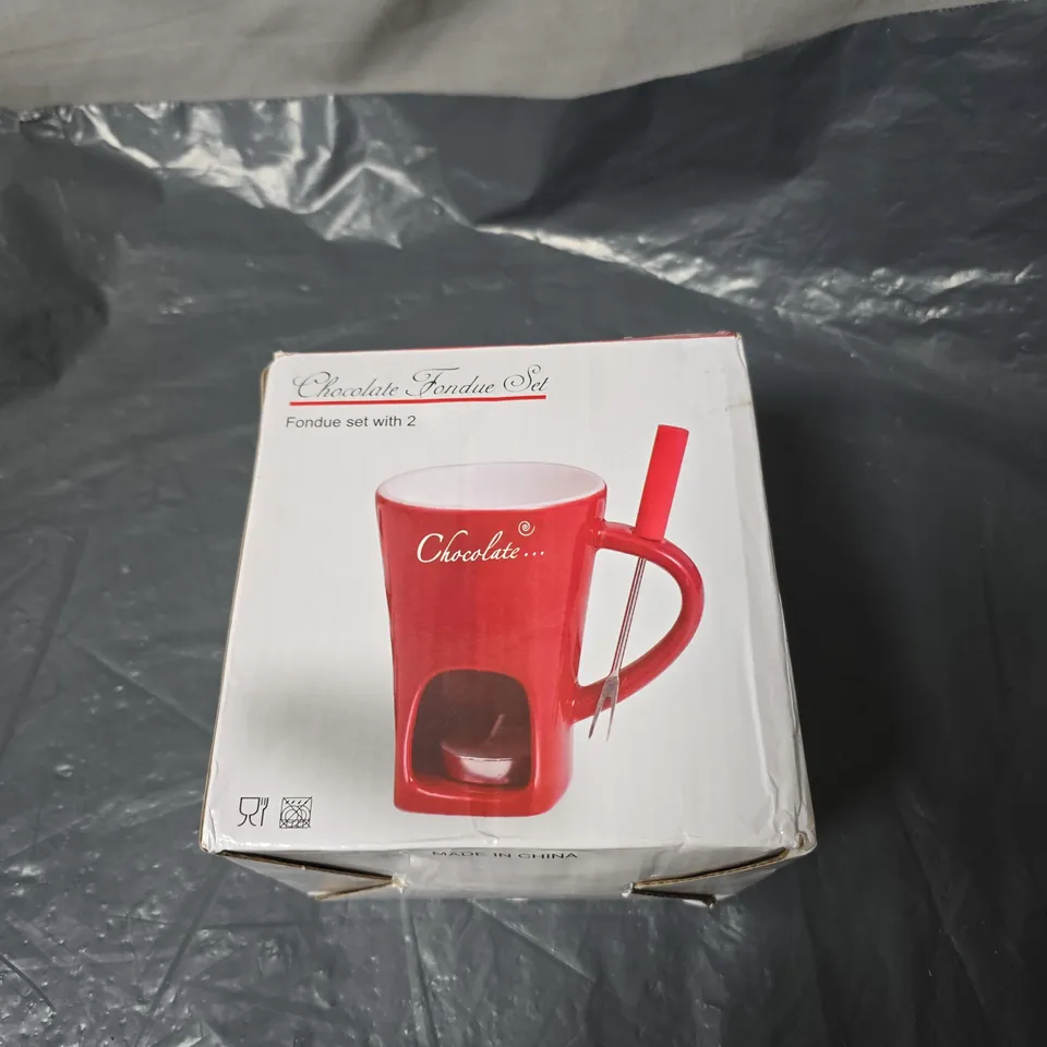 BOX OF APPROXIMATELY 12 ASSORTED HOUSEHOLD ITEMS INCLUDING DOUBLE KNITTING ACRYLIC WOOL . CHOCOLATE FONDUE SET AND VEGETABLE CHOPPER 