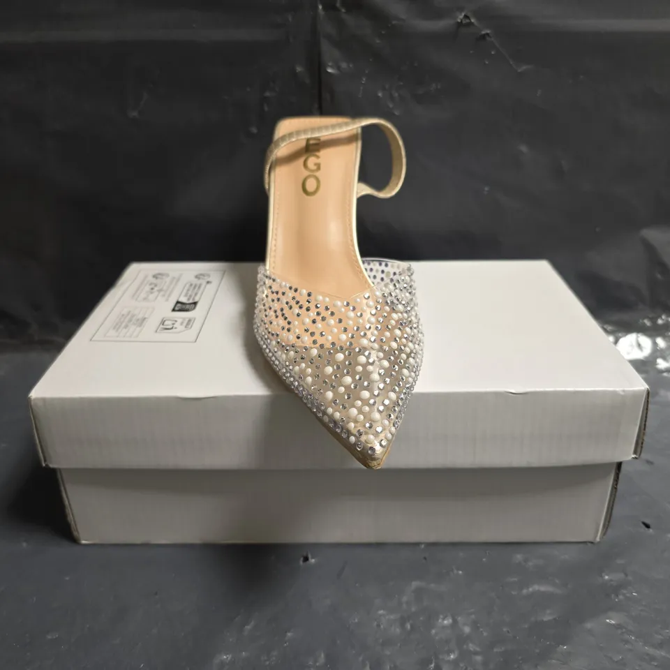 BOXED PAIR OF EGO POINTED TOE LOW HEEL SHOES IN CLEAR W. JEWEL DETAIL SIZE 5