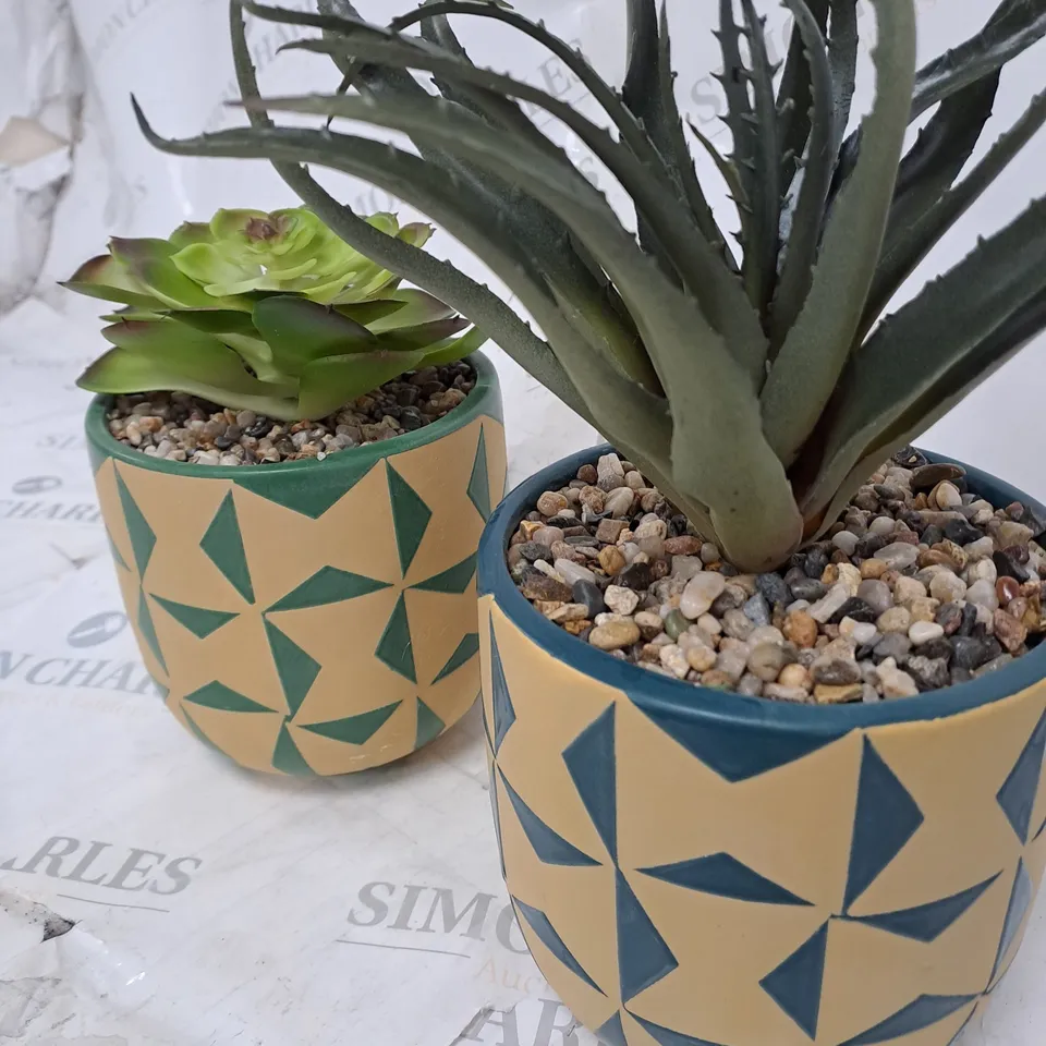 2 X FAUX POTTED PLANTS 