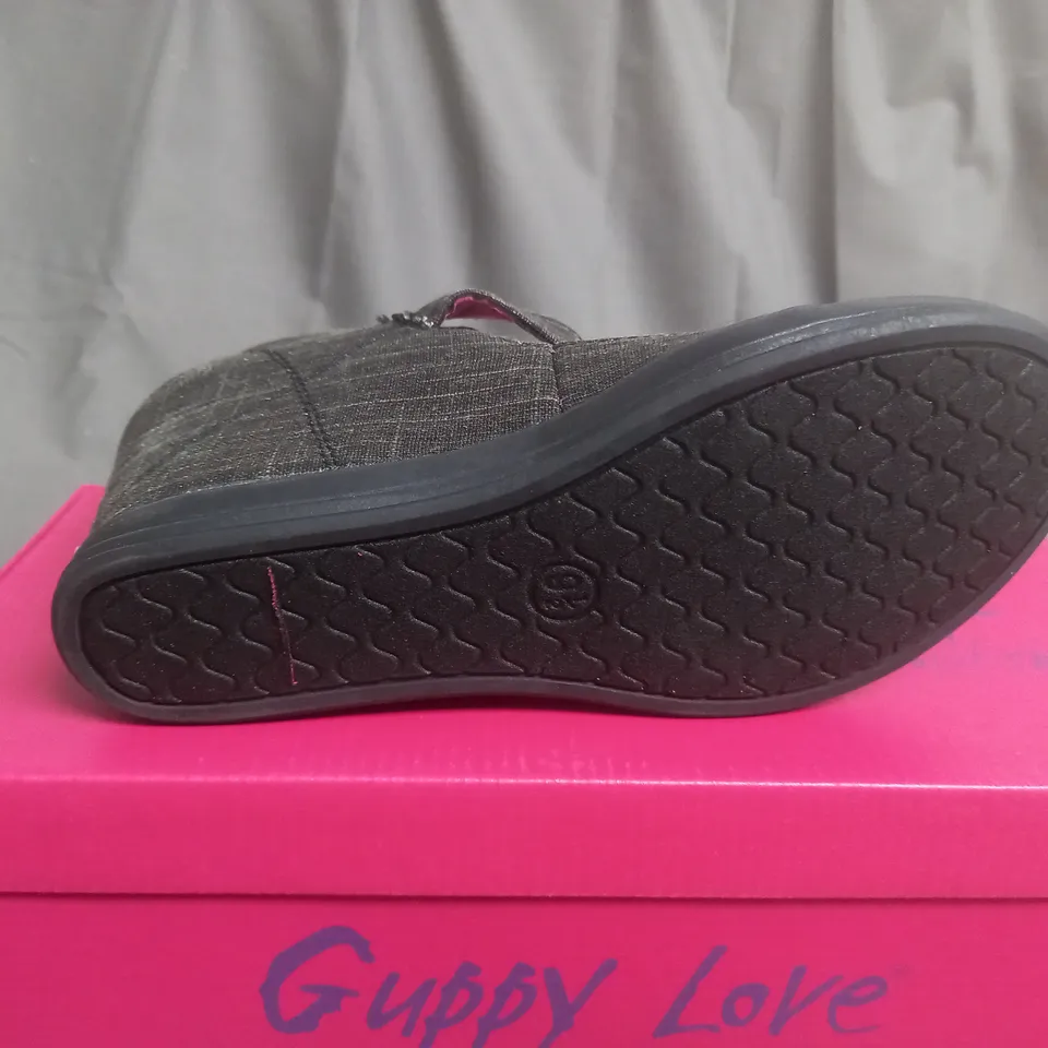 BOX OF APPROXIMATELY 10 BLACK  GUPPY LOVE BY BLOWFISH SHOES IN VARIOUS SIZES 