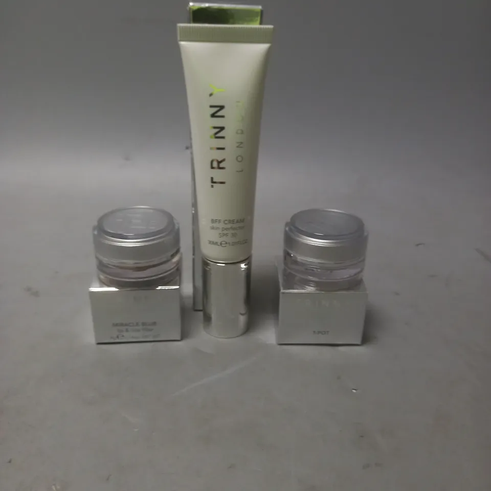 LOT OF 3 TRINNY LONDON SKIN CARE PRODUCTS TO INCLUDE BFF CREAM SKIN PERFECTOR 30ML, MIRACLE BLUR LIP & LINE FILLER 4G AND A T-POT REFILL POT