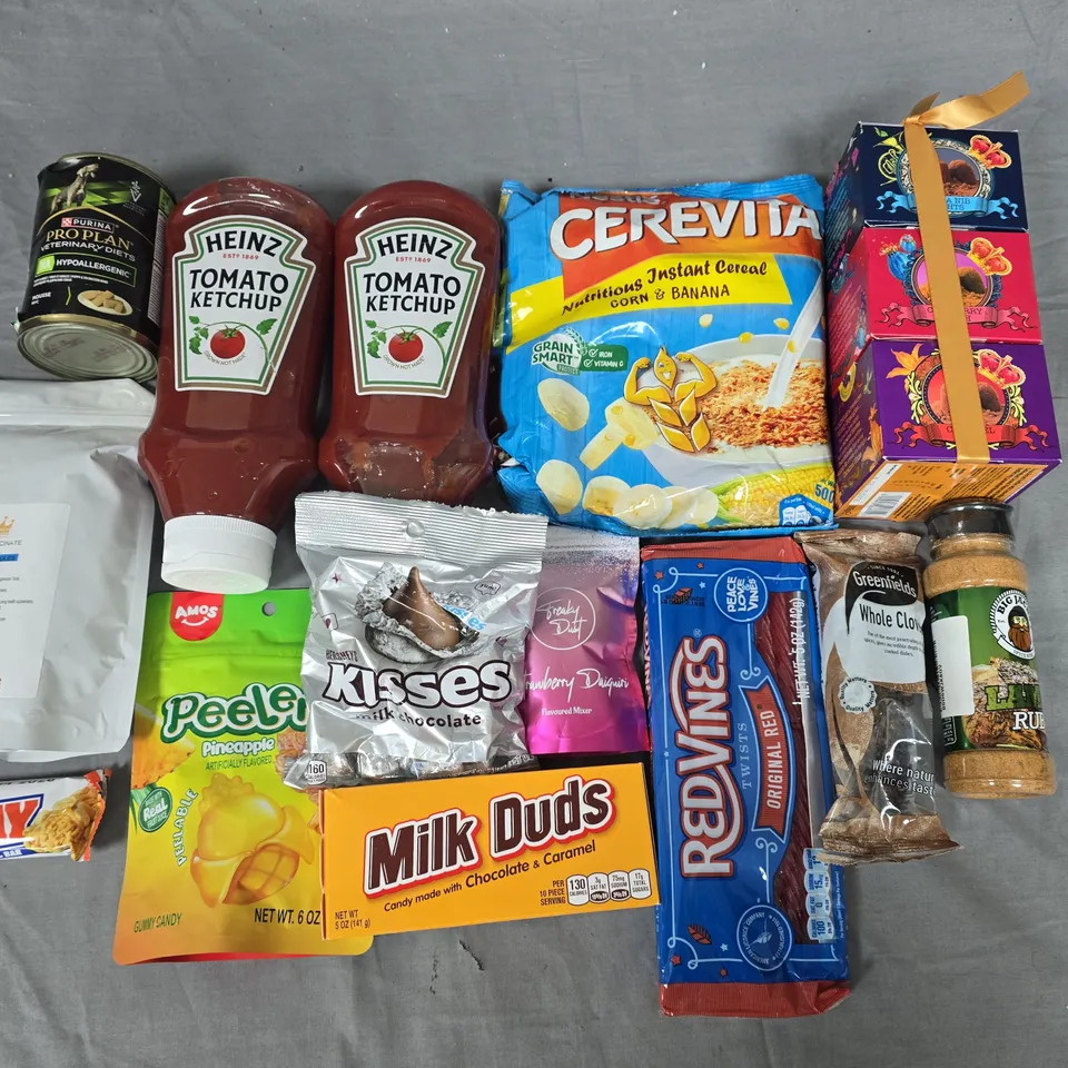 LARGE QUANTITY OF ASSORTED FOOD ITEMS TO INCLUDE CELEBRATIONS, BLACK PUDDING, TOMATOE SAUCE AND COFFEE SET