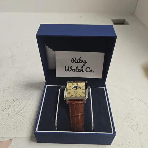 RILEY WATCH CO. RECTANGULAR STAINLESS STEEL WRISTWATCH WITH BROWN LEATHER STRAP (BOXED)