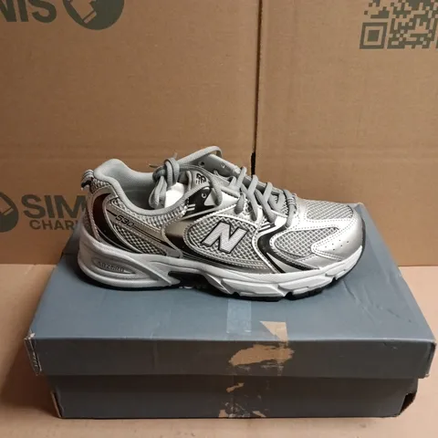 BOXED PAIR OF NEW BALANCE 530 TRAINERS IN A METALLIC SILVER - 5