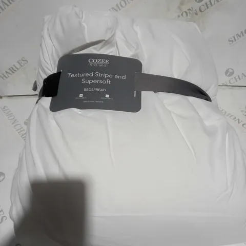 boxed COZEE HOME TEXTURED STRIPE AND SUPERSOFT BEDSPREAD - 250 BY 260CM