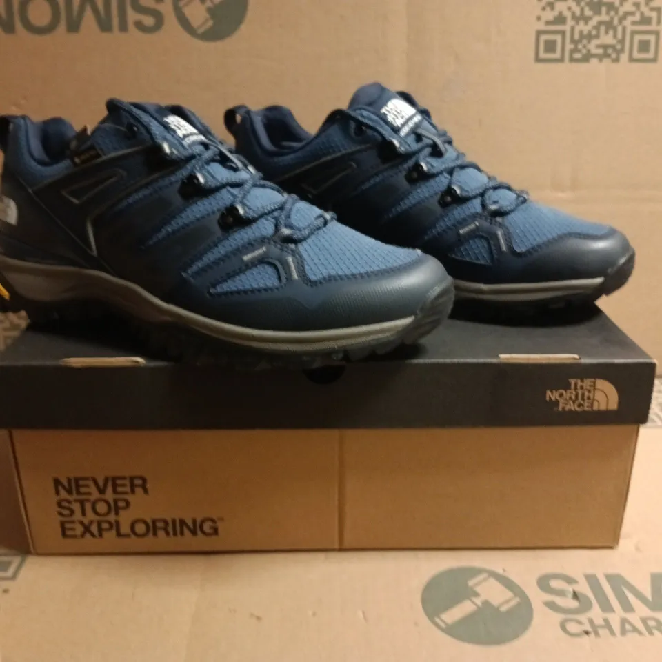 BOXED PAIR OF THEW NORTH FACE TRAINERS IN NAVY/BLUE SIZE UK 8.5
