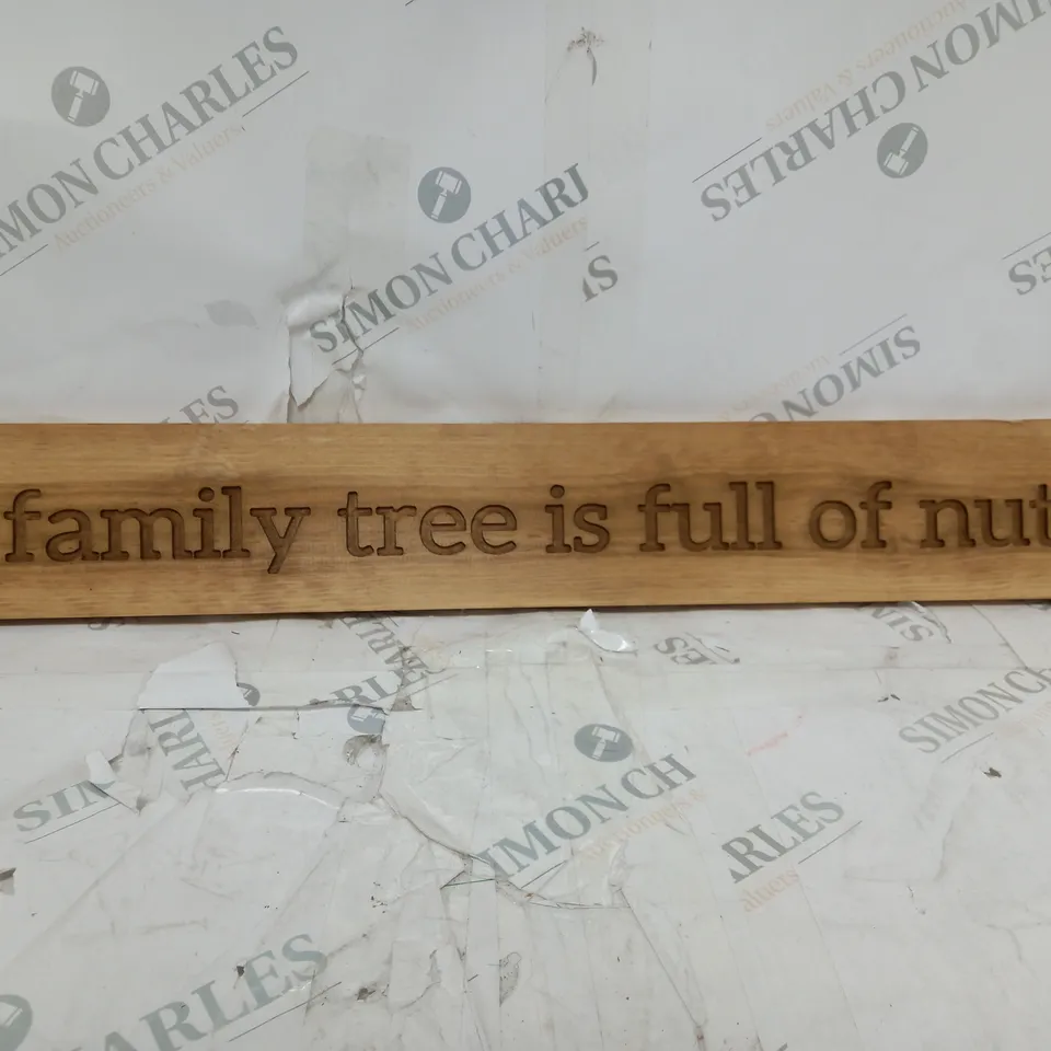 WOODEN SIGN- OUR FAMILY TREE IS FULL OF NUTS 