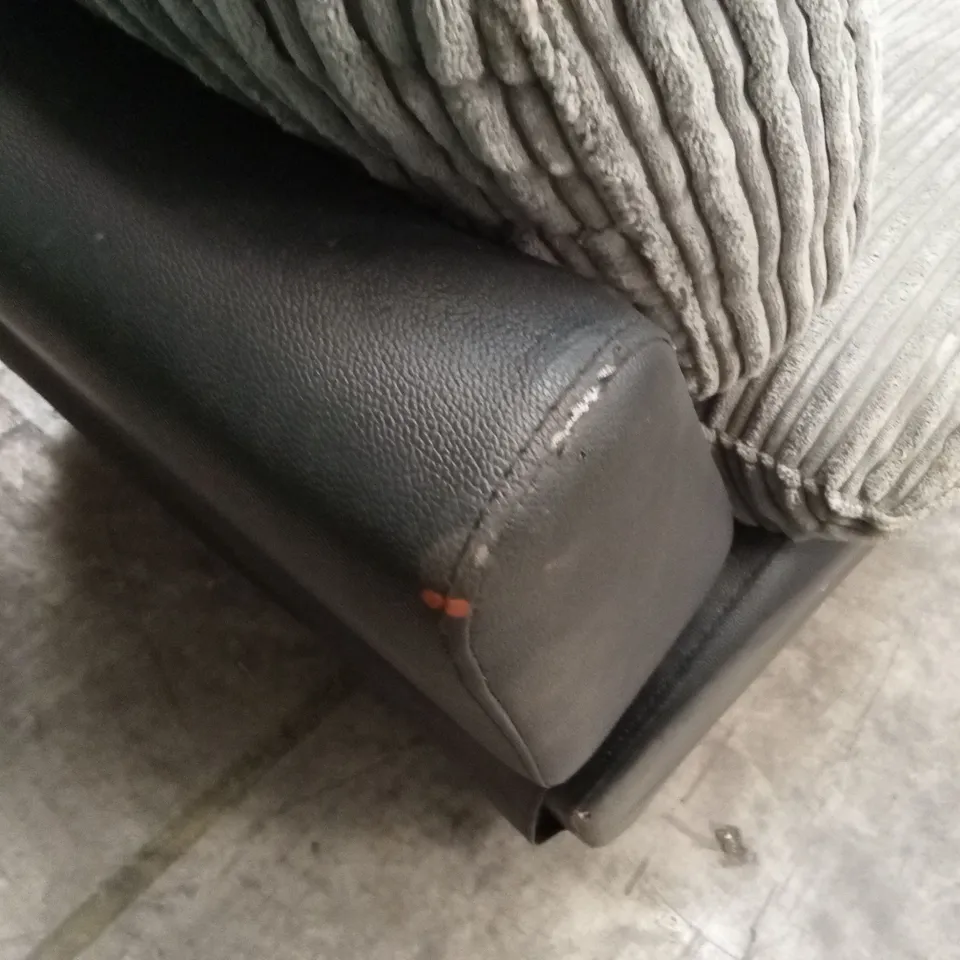 ARMSTRONG FABRIC AND FAUX LEATHER MANUAL RECLINER SOFA