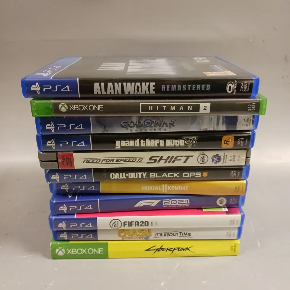 11 X ASSORTED VIDEOS GAMES TO INCLUDE ALAN WAKE, GOD OF WAR, MORTAL KOMBAT 11 ETC